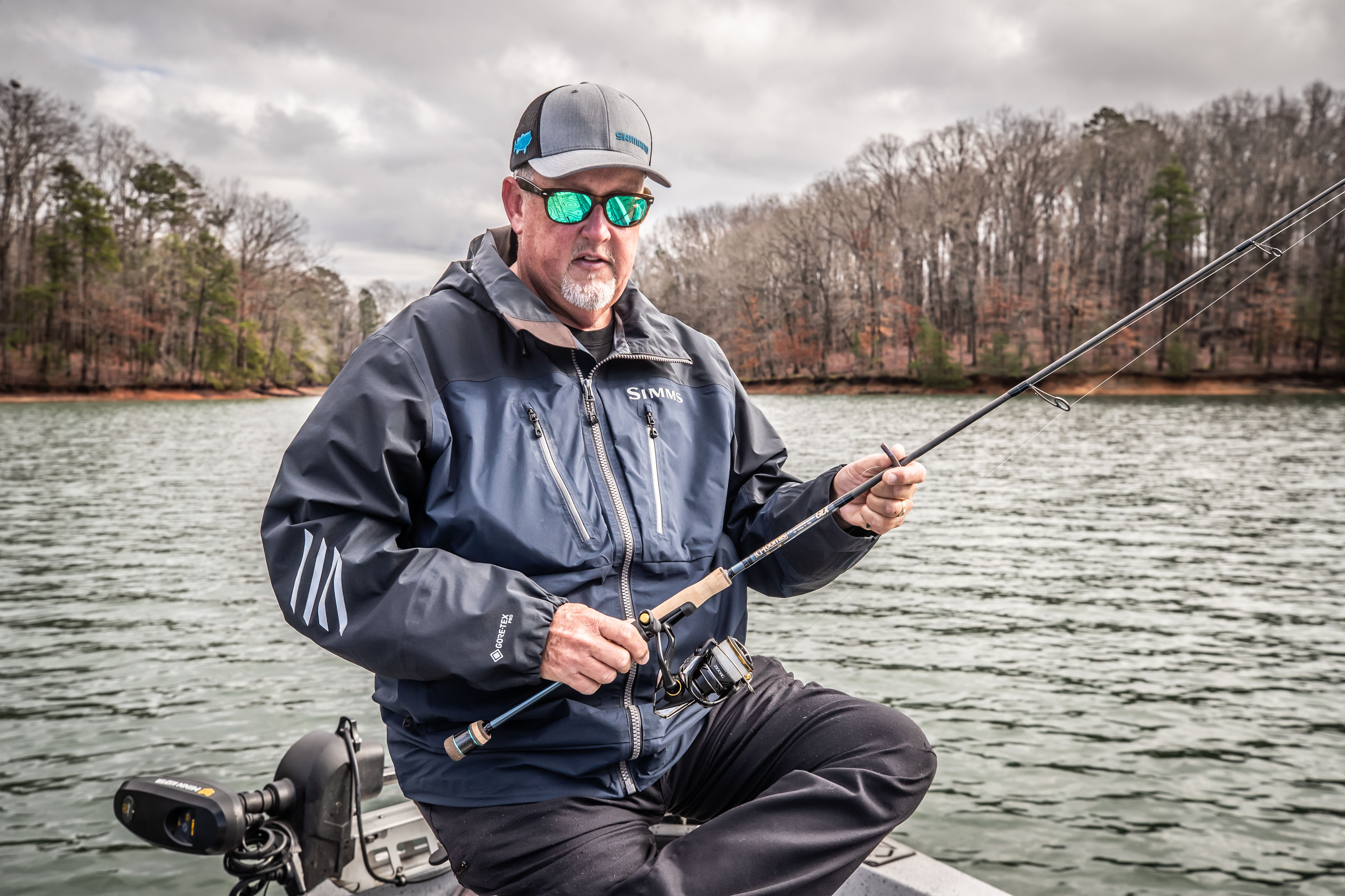 Jimbo holding fishing rod